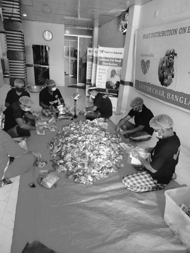 Volunteers preparing Qurbani meat parcels